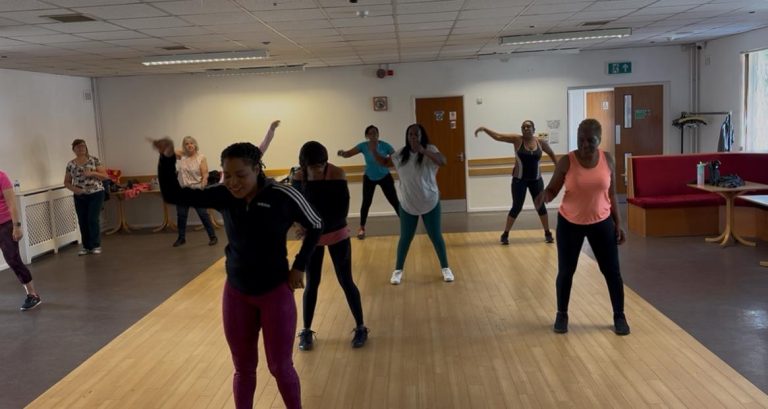 Women over 30 dancing together at a Zumba wellness class in Chemsley Wood, Birmingham